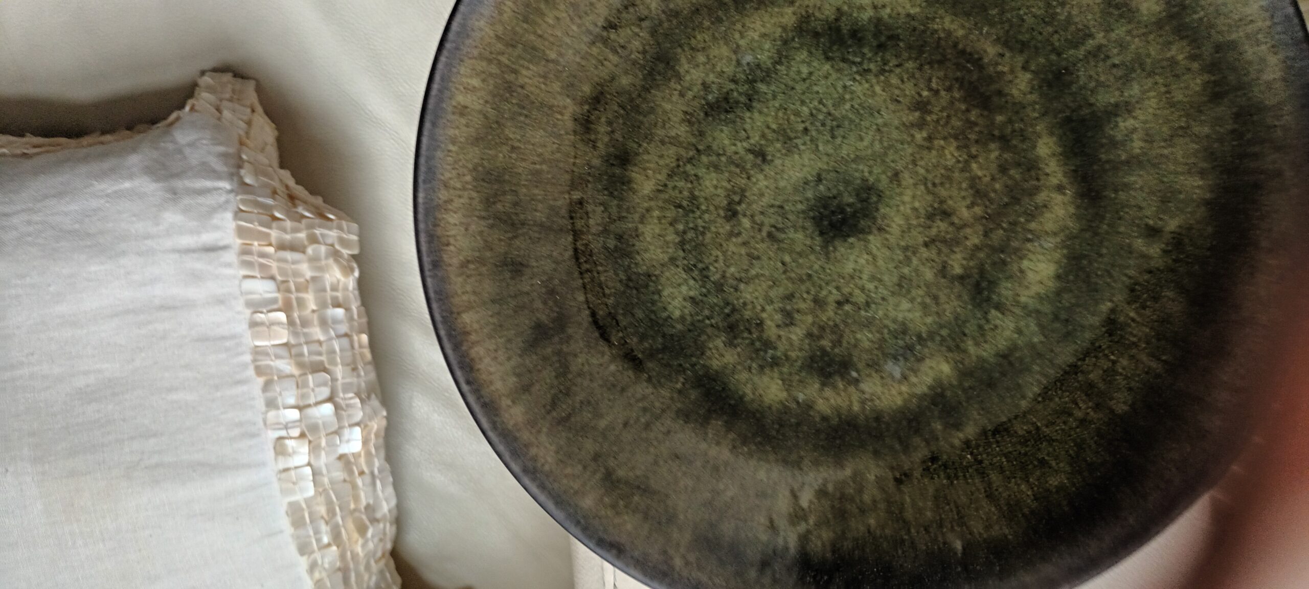 handmade ceramic plate, crackle glaze with a black mat finish for informal dining. Plate is made by Jars a French company.