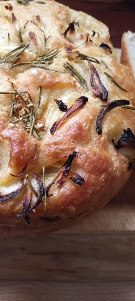 Freshly baked focaccia bread, topped with Rosemary, red. onions, freshly ground Seasalt and brushed with crushed garlic infused in Rapeseed oil.